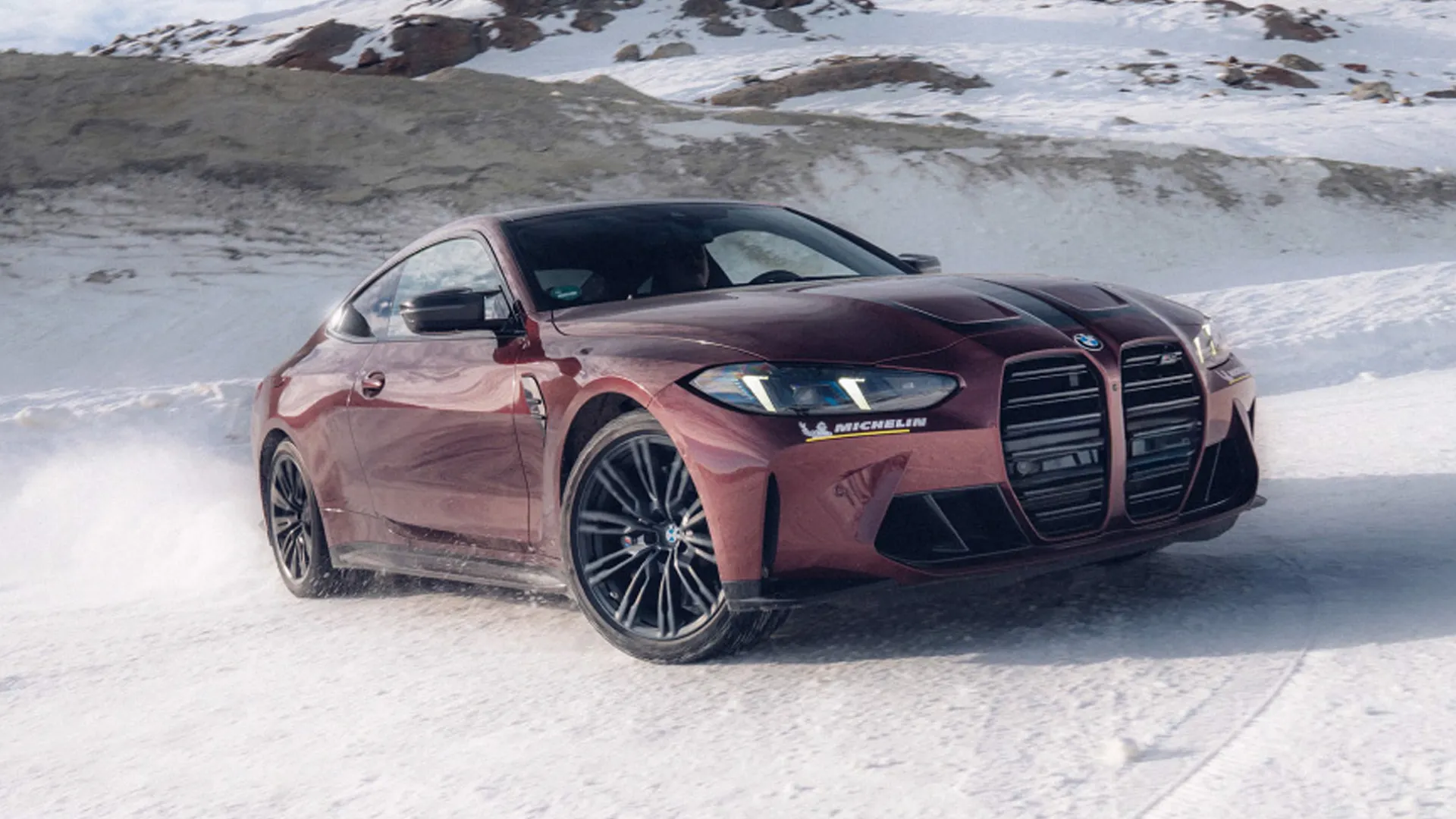 Aventurin Red Metallic BMW M4 in the snow