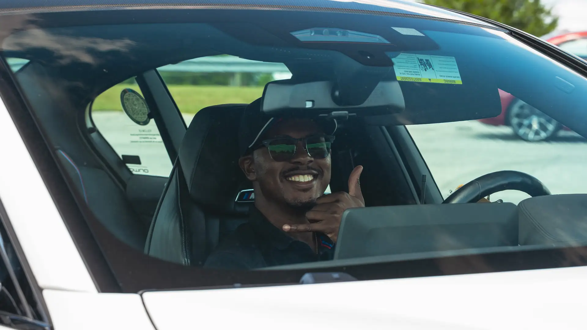 BMW driving instructor, smiling