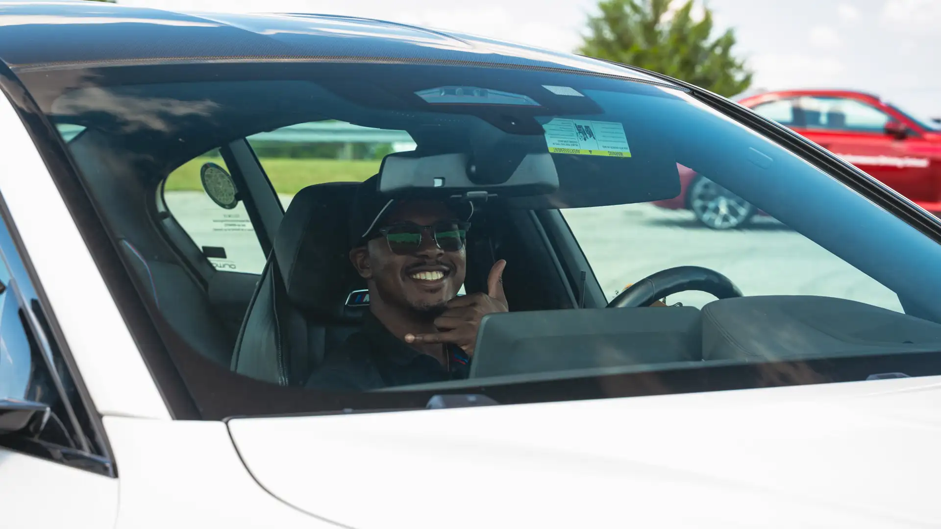 BMW driving instructor smiling