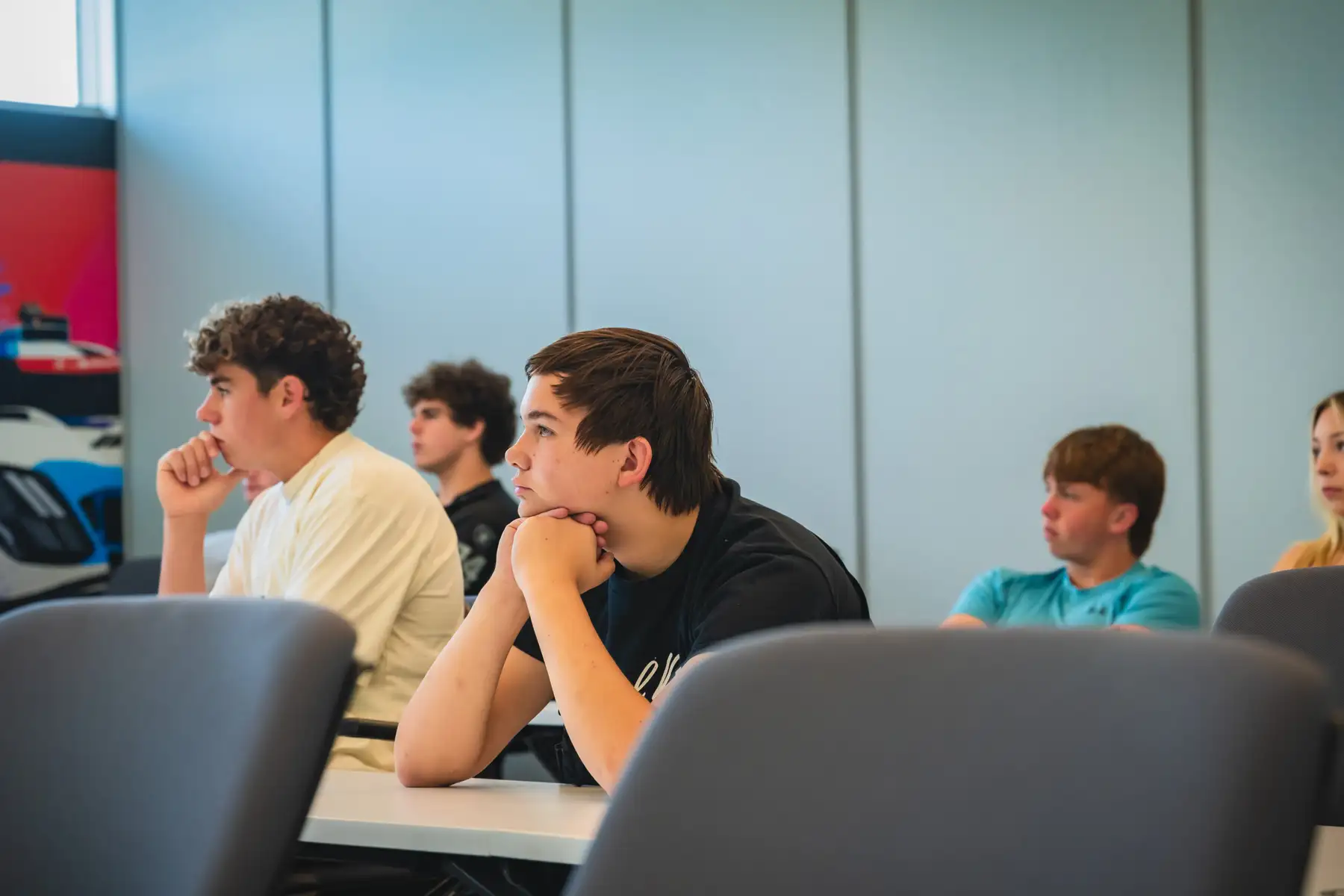 BMW teen driving students in class