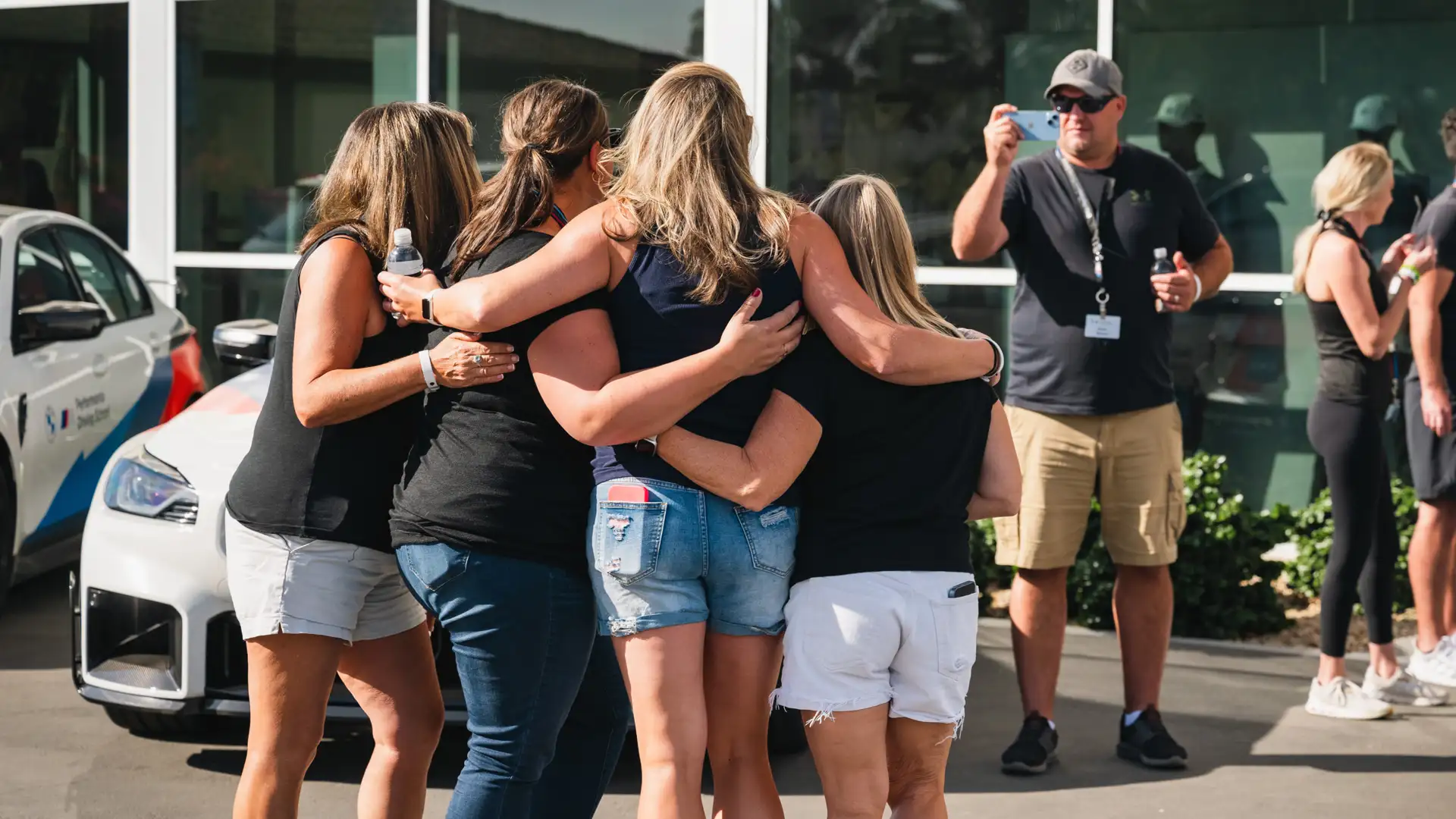 BMW group event pose